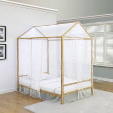 The gold metal sides of the canopy bedframe offer stability. Altadena White Twin Metal Canopy Bed 1stopbedrooms