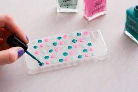 Nail polish bottle phone ring holder print out a nail polish bottle you would like to use and cut it out take a sheet protector and place the nail polish bottle in with the seam on bottom and leave the top of the nail polish bottle hanging out Use Nail Polish To Decorate Your Own Phone Case Handyhulle Selber Gestalten Diy Nagellack Handyhulle Gestalten