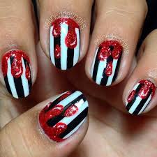 Black And White Striped Nails Halloween 35 Cute And Spooky Nail Art Ideas For Halloween Fun Halloween Nails Halloween Nails Diy Oval Nails Designs