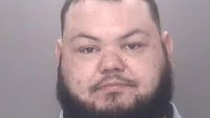 Man arrested, charged following shooting in Rowland area