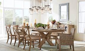 A dining room chandelier (or other hanging fixture) traditionally hangs above the center of the dining table and is a primary design feature in the room. Dining Room Lighting Ideas For Every Style Pottery Barn