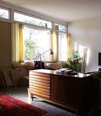 We knew we would likely need to go custom for window treatments because our house was built in 1939 and our windows aren't standard sizes. Retro Design Dilemma Window Treatments For Lori S Mid Century Modern Living Room