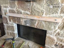 We carry that as well as electric stoves, wall fireplaces, and a great selection of contemporary electric fireplaces. How To Build And Hang A Mantel On A Stone Fireplace Shanty 2 Chic