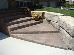 Boost the elegance and class of decorative concrete in your landscaping plans. Stamped Concrete Steps With Armour Stone Retaining Wall Traditional Landscape Toronto By Lester Contracting Houzz