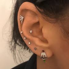 This Client In Thedubaimall Was Looking For An Elegant Update To A Stretched Earlobe Our Stylist Were Happy To Hel Ear Peircings Cool Piercings Ear Piercings