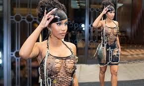 Cardi B leaves nothing to the imagination as hard-partying rapper leaves  her New York hotel in a sheer fishnet minidress at 3:30am | Daily Mail  Online