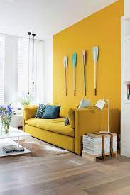 On the sherwin williams website, kilim beige is classified as an orange paint color, which seems strange. 25 Yellow Accent Walls To Cheer Up Your Home Shelterness