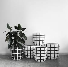 Black And White Flower Pot Design We Source Unique Limited Edition And Designer Made Product From Around The Globe Paint Garden Pots Minimalist Home Decor Diy Pots