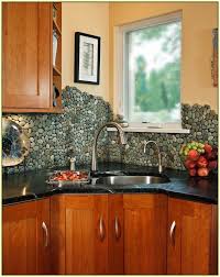 Natural stone field tile is a superb choice for fireplace facades, feature walls, backsplashes, shower floors and bath walls. I Kind Of Like River Rock Backsplashes In The Right Setting But I Kind Of Really Diy Kitchen Backsplash Colorful Kitchen Backsplash Trendy Kitchen Backsplash