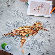 Grid lines are darker in 10 x10 sections to make reading the pattern, counting the stitches and keeping the pattern also has arrows to indicate the center of the design. Orange Detailed Bird Steampunk Cross Stitch Pattern Hand Etsy Cross Stitch Patterns Cross Stitch Embroidery Embroidery Patterns