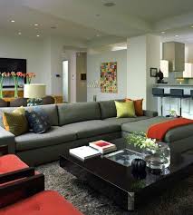 Gray Sectional With Warm Throw Pillows And Coordinating Accent Chair Living Room Grey Sectional Sofas Living Room Contemporary Sectional Sofa