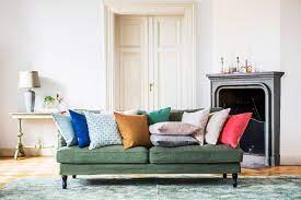 An Eclectic Mix Scatter Cushions En Masse Green Sofa With Mix And Matched Cushions Ikea Stocksund So Dream House Decor Ikea Stocksund Elegant Living Room