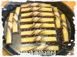 الكعك المعسل من المطبخ الليبي لزينب محمد / الكعك الحلو الليبي , افضل وصفات لصناعة الحلويات الليبية. Ø§Ù„Ù…Ø·Ø¨Ø® Ø§Ù„Ù„ÙŠØ¨ÙŠ ØªØµÙ Ø§Ù„Ù‚Ø·Ø¹ ÙÙŠ ØµÙŠÙ†ÙŠØ© Ø§Ù„ÙØ±Ù† Ùˆ ØªØ¯Ù‡Ù† Ø¨ØµÙØ§Ø± Ø§Ù„Ø¨ÙŠØ¶ Ø§Ù„Ù…Ø®Ù„ÙˆØ· Ù…Ø¹ Ù‚Ø·Ø±Ø§Øª Ø§Ù„Ù„ÙŠÙ…ÙˆÙ† Ùˆ ØªØ±Ø´ Ø¨Ø®Ù„ÙŠØ· Ù…Ù† Ø§Ù„Ø³ÙƒØ± Ùˆ Ø§Ù„Ù…Ù„Ø­ Ùˆ ØªØ²ÙŠÙ† Ø¨Ø§Ù„Ø³Ù…Ø³Ù… Ù…Ù† Ø§Ù„Ù…Ù†ØªØµÙ Facebook