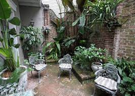 Before And After Target Transforms 3 New Orleans Courtyards Backyard Garden Backyard Garden Beds Small Backyard Gardens