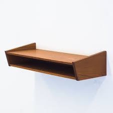 Tough enough to withstand daily use without losing their beauty. Vintage Teak Floating Wall Shelf 91180