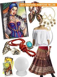 She wears an off shoulder blouse, a brown corset belt, a long and colorful maxi skirt, a hip scarf, a head scarf, a necklace and earrings, bracelets, and black leather boots. Pin On Halloween Costume Ideas