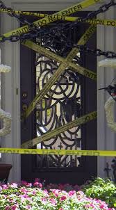 Caution Tape Door With Chains To Keep The Kids From Walking Between The Columns Halloween Front Doors Halloween Door Decorations Halloween Outdoor Decorations