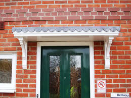Check this door awning idea. Timber Door Canopies By George Woods Handcrafted In Devon Uk
