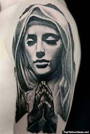 They are a predominantly catholic country and the virgin mary, rosary beads and crossed hands are often depicted in mexican tattoo art. Man Left Half Sleeve Grey Ink Virgin Mary Tattoo Mother Mary Tattoos Mary Tattoo Virgin Mary Tattoo