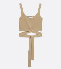 Stay ahead of the trend in textured and colourful pieces from & other stories and monki that can be layered for extra warmth when it's really time to wrap up. 12 00 For Blue Vanilla Camel Fine Knit Tie Crop Top New Look Deal Direct Co Uk