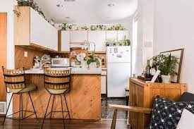 Found Jungalow Boho Minimalist Apartment Where Plants Are Boss Hunker Above Kitchen Cabinets Decorating Above Kitchen Cabinets Kitchen Style
