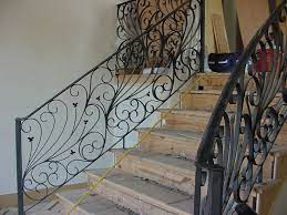 This Custom Spiral Design Was Created Using Our Fabricated Wrought Iron Services These Unique Components Are M Iron Railing Stair Remodel Wrought Iron Railing