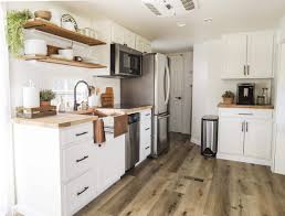 We are adding space for my husband's big green egg, a duel gas burner, outdoor frig, and utility sink. Rv Kitchen Remodel New Cabinets Sink Before And After