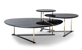 Our beverly coffee table is hand woven of natural rattan with lattice apron, wrapped joints and tempered glass top. Luxury Coffee Tables Sculptural Coffee Table Design Taylor Llorente Furniture