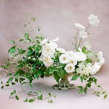 White And Green Ethereal White Floral Arrangements Flower Arrangements White Wedding Flowers