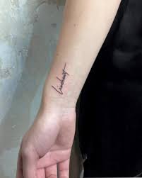 A bunny wrist tattoo design. A Word Lionheart Inked On The Right Inner Wrist Inner Wrist Tattoos Girl Thigh Tattoos Wrist Tattoos Words