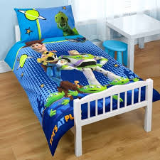 By the time the little boy is ready for his very own toddler bed, he knows all about woody and buzz, jessie and bullseye and all the other characters that have made the toy story trilogy so lovable. Toy Story Toddler Bedding Set Toddler Bed Set Toddler Bed Duvet Cover Toddler Bed