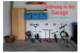 Ordnung In Der Garage Parkplatz Fur Kinderfahrzeuge Garage Fahrradkeller Fahrzeuge