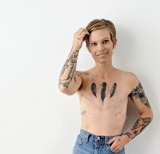 The flowers make the design more visually appealing while highlighting the feminine aspect of the ribbon symbol and breast cancer in general. Cancer Survivors Transform A Landscape Of Pain Into Something Beautiful And Unique 614now