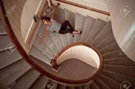 They're a central element of the design. Young Man Falling Down Into The Steep Spiral Staircase Stock Photo Picture And Royalty Free Image Image 23129244