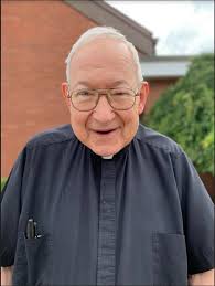 FATHER J. RUSSELL MAURER