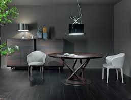 Un Attimo Di Relax Una Rivista Un Caffe Tavolo Mandarin Con Basamento In Legno In Cui Si Rincorrono Giochi Di L Dining Table Chairs Dining Table Table