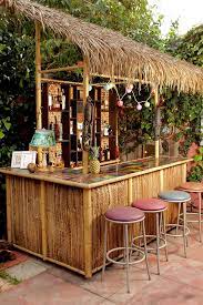 When We Decided Last Summer That Our Backyard Had Been Tiki Bar Less For Far Too Long We Called Upon Our Good Bu Tiki Bars Backyard Backyard Bar Tiki Bars Diy