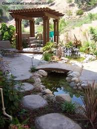 Window moldings and splashes of color in the stair and flower bed tiles bring a sophisticated spanish. Small Backyard Design Landscaping Network