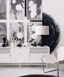 If you need additional black and white living room ideas, check out the simple white cubby storage that's filled with a mixture of dark and light accessories. Lving Room Paint Ideas Ways To Transform With Accent Walls