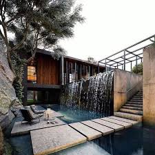 10 Most Spectacular Pool Waterfalls That Will Surprise You Home Design And Interior Waterfall Design Backyard Design Modern Villa Design