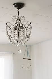 Pin By Carrie Soucy On All About Baby Nursery Light Fixture Nursery Lighting Nursery Chandelier