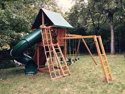 Here S Our Ultimate Wooden Swing Set With Three Big Upgrades A Horse Glider Swing For Two A Set Of Monkey Bar Wooden Swing Set Backyard Swing Sets Swing Set