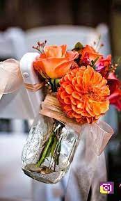 Ftd offers a wide selection of wedding flowers to say congratulations or thank you for the invite, to be used as centerpieces at a rehearsal dinner, for the bride to hold while she walks down the aisle, or any other wedding need you may have. Wedding 29 Stilvolle Moglichkeiten Zum Hinzufugen Von Orange Um Ihre Herbst H Flower Centerpieces Wedding Fall Wedding Decorations Wedding Flower Arrangements
