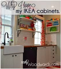 The cabinet looks like it's going to hit the window trim but a clever mechanism slides the cabinet door out of the way. Why I Love My Ikea Kitchen Cabinets Newlywoodwards