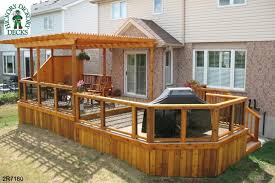 Ft.) lower deck with a bench and planter boxes, and steps down to the yard or patio. Pergola Diy Deck Plans