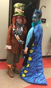 The blue caterpillar from alice in wonderland. Our Costumes Rock Alice In Wonderland S Mad Hatter And Caterpillar With April Sanders Alice In Wonderland Costume Wonderland Costumes Caterpillar Costume