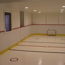 Mason's basement rink with hockeyshots synthetic #hs_synthetic_ice #hockeyshot getting closer to done, still alot of hours to put. Hockey Rink In Basement Design Ideas Pictures Remodel And Decor Basement Design Ideas Basement Design Hockey Room
