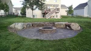 For fire pit rings, fire pits, covers and fire pit pads, shop our premium finds at low prices from serenity health & home decor. Interlock Serano Pavers With Grand Fire Ring Kit Fieldstone Boulders And Rosetta Irregular Steps Patio Pavers Design Fire Pit Patio Patio