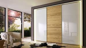 These incredible sliding wood closet doors are equipped with both durable and adjustable features making them very popular among customers. China Morden Sliding Door Bedroom Closet China Wardrobe Closet Board