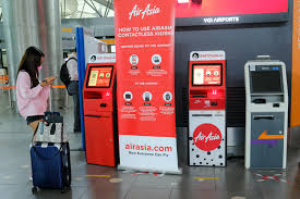 We went to air asia counter there at kuala lumpur airport close to the visa on arrival office and explained the scenario asking help from air asia staff said who? Airasia To Charge Passengers Who Check In At Airport Counters Bloomberg